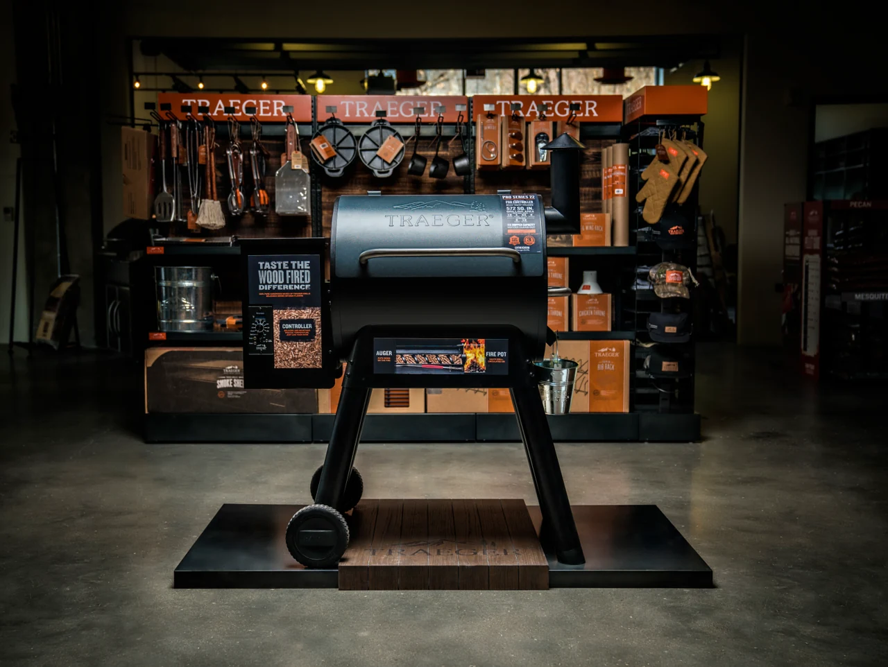 Traeger branded retail environment with a grill at the center of the experience
