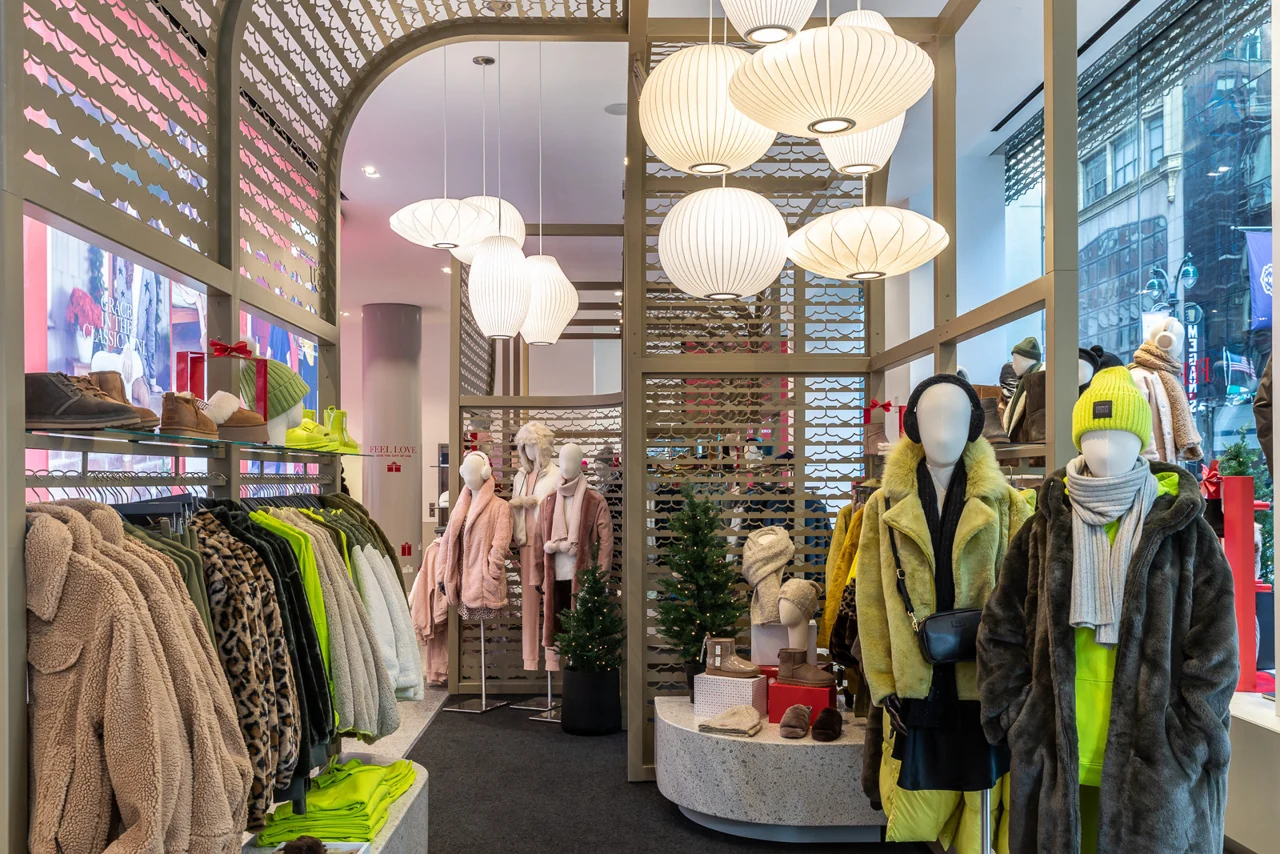 Warm wood, sculptural fixtures and lighting in the UGG New York flagship